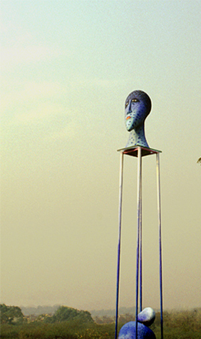 Medium: 'Papier Mache, Gouche paints, Steel-stand', Size: '180 x 30 x 30 cm'