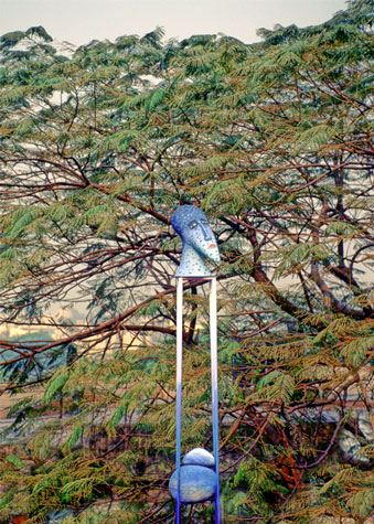 Medium: 'Papier Mache, Gouche paints, Steel-stand', Size: '180 x 30 x 30 cm'